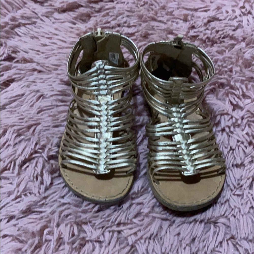 Gold gladiator style straps sandals